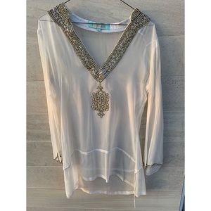 Kareena’s white cover up